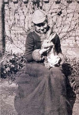 Beatrix holding a pet rabbit. 